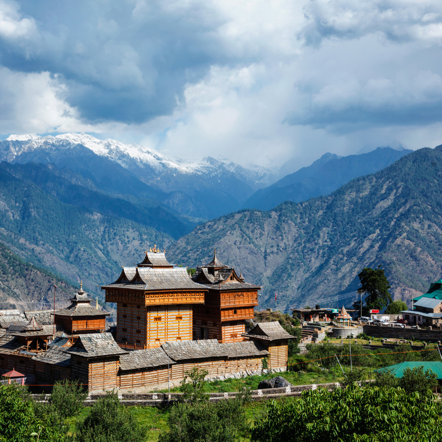 Traveler trekking through mountain village
