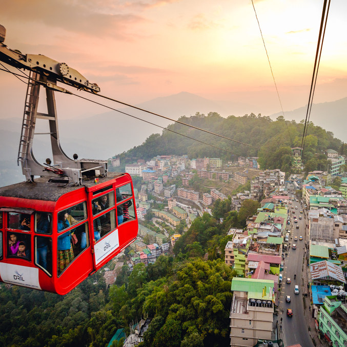 Cable car at sunset – scenic hill travel tour
