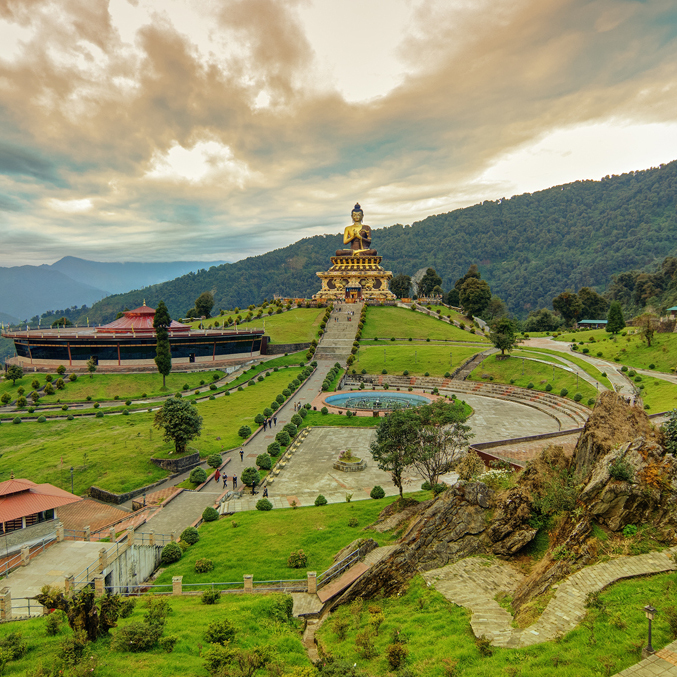 Golden Buddha on hill – serene travel tour