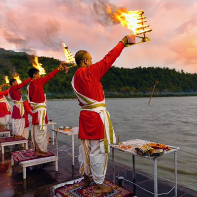 Sunset ceremony by river – cultural travel adventure