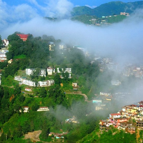 Hill homes in mist – nature and travel adventure