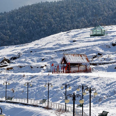 Cozy huts on snowy hills – winter holiday escape